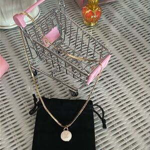 Authentic LV Double Sided White and Gold Pull Charm with Dust Bag NEW